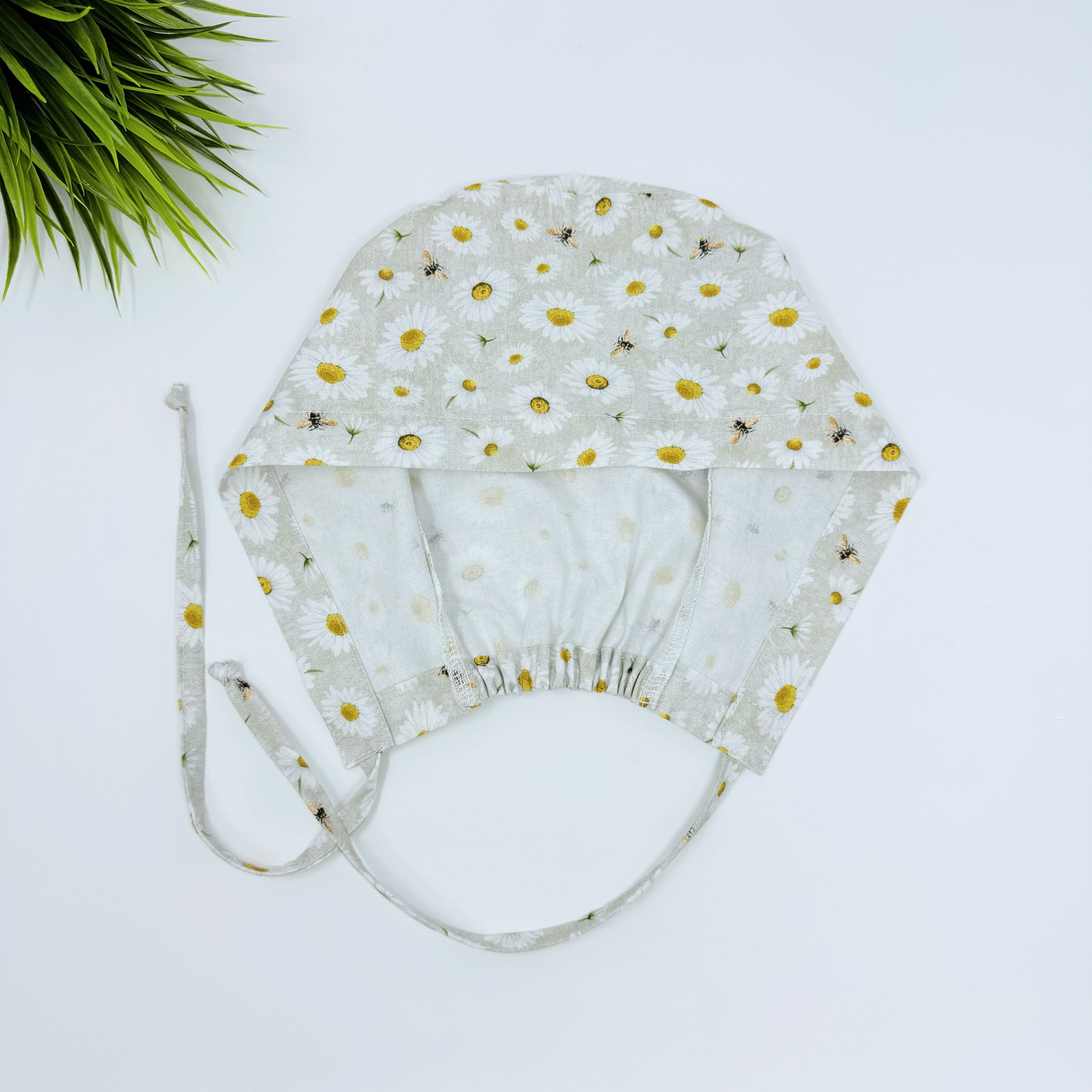 Bee And Daisy Skull tie-back style surgical scrub cap for men by Paradise Caps.