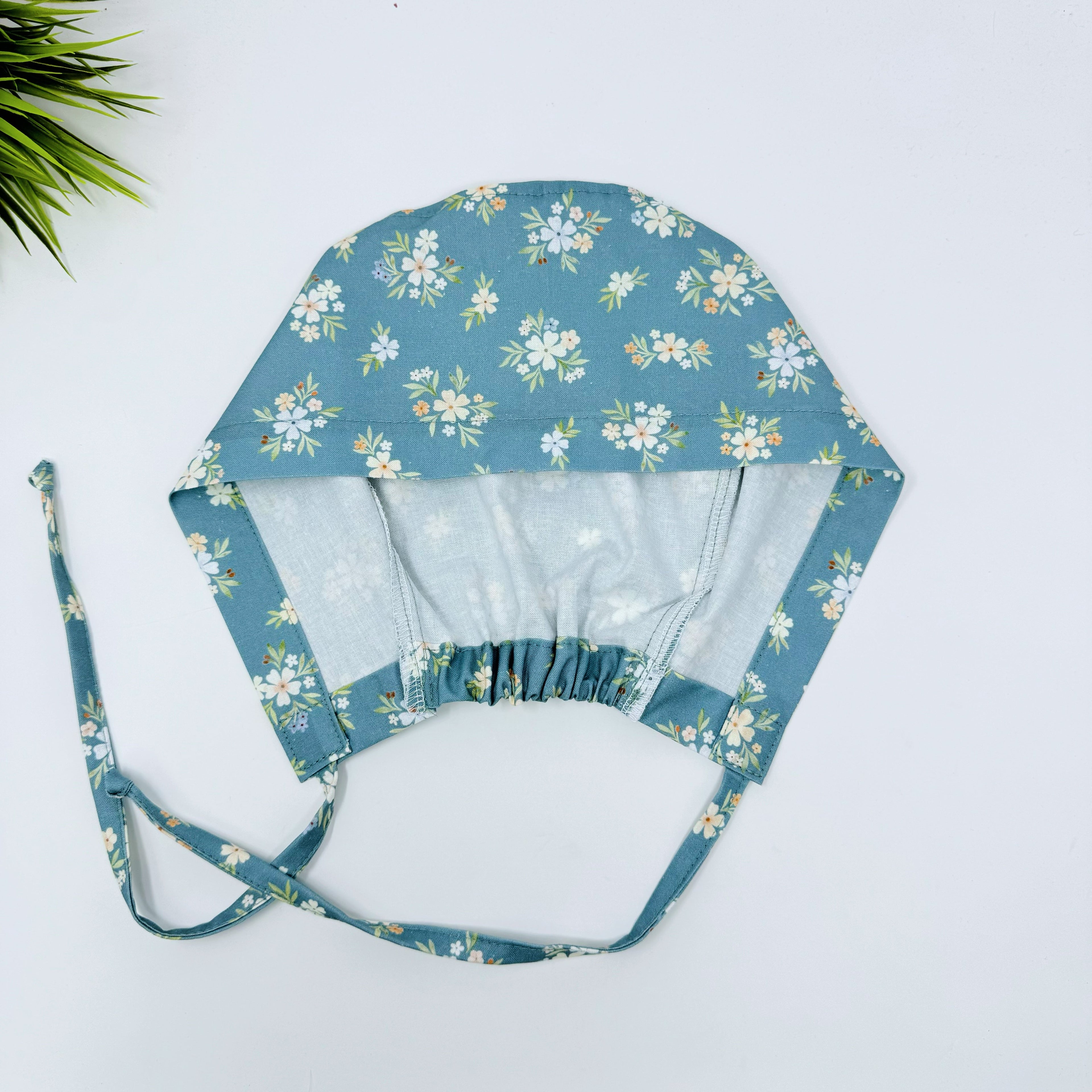Sage Posies Skull tie-back style surgical scrub cap for men by Paradise Caps.