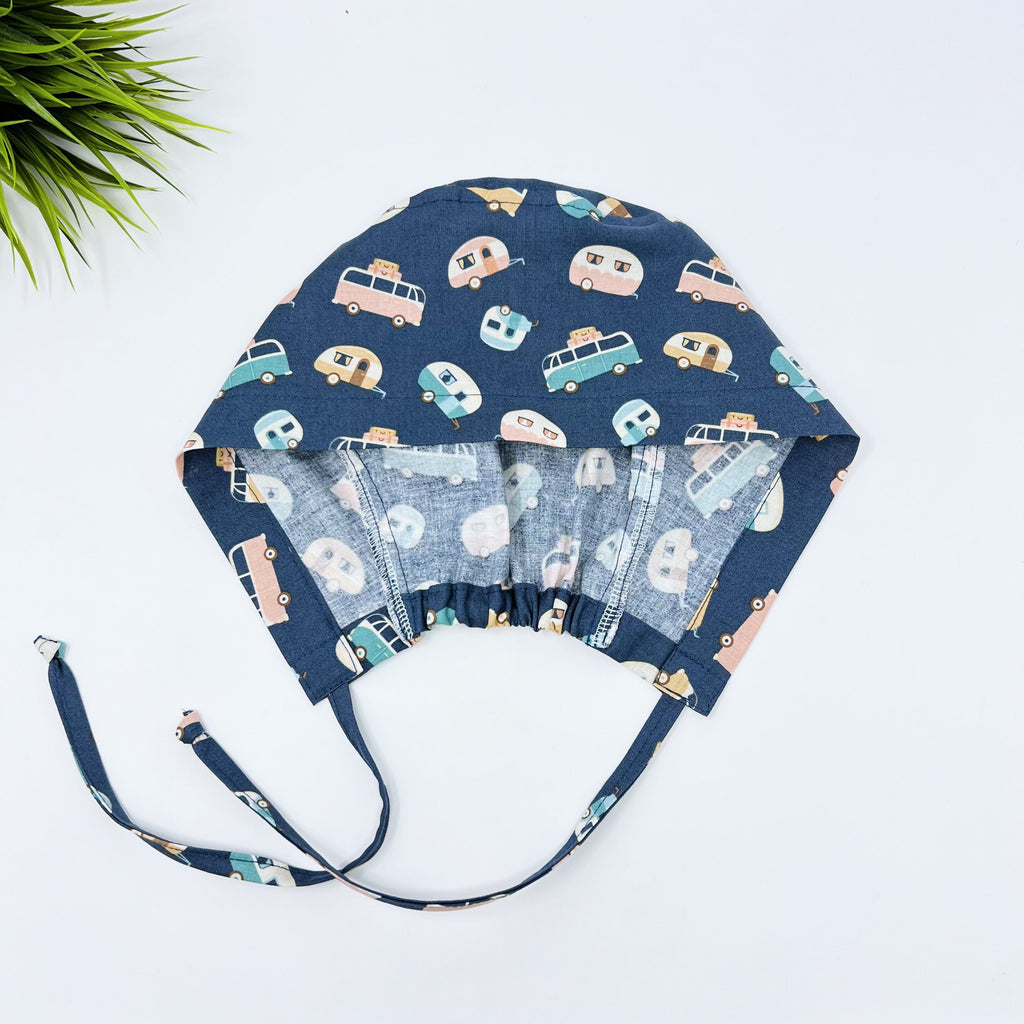 Trailer Toss Skull tie-back style surgical scrub cap for men by Paradise Caps.