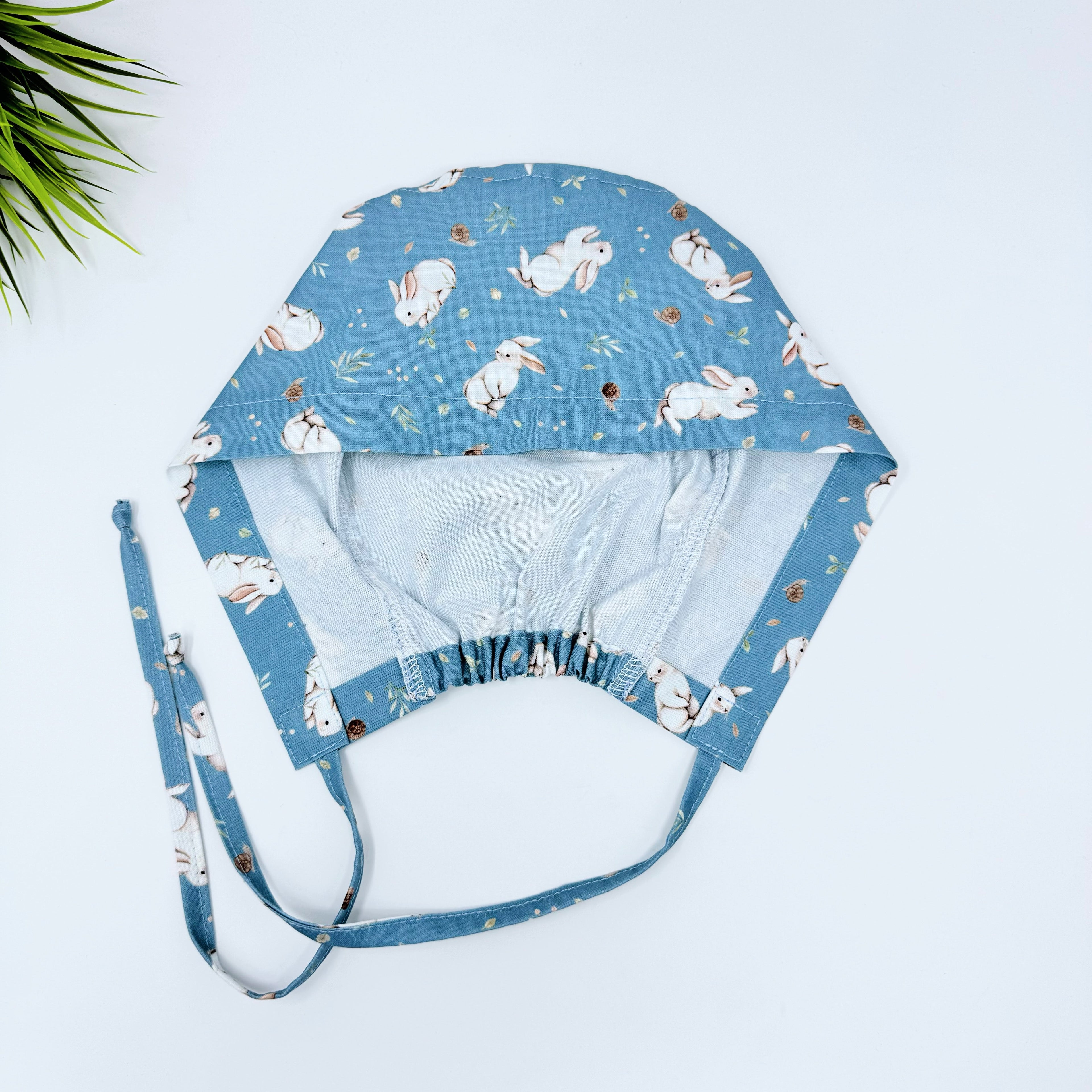 Sage Bunnies Skull tie-back style surgical scrub cap for men by Paradise Caps.