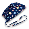 Holiday planet Skull tie-back style surgical scrub cap by Paradise Caps.