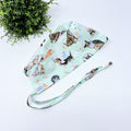 Easter dogs Skull tie-back style surgical scrub cap for men by Paradise Caps.