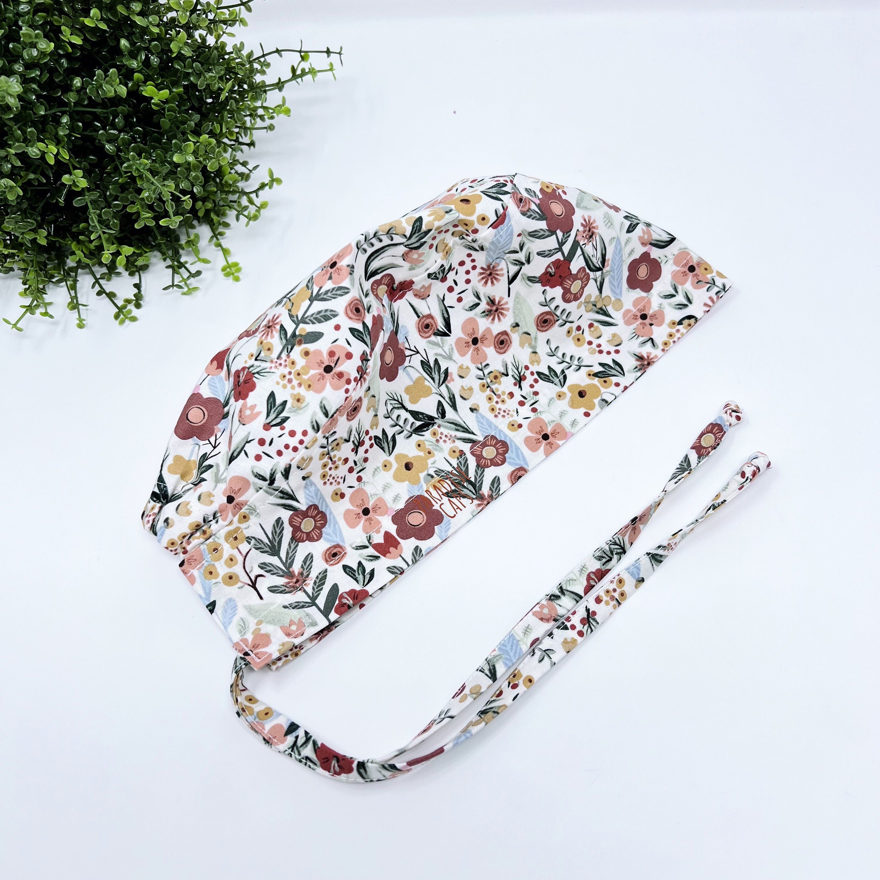 Flowers Skull tie-back style surgical scrub cap for men by Paradise Caps.