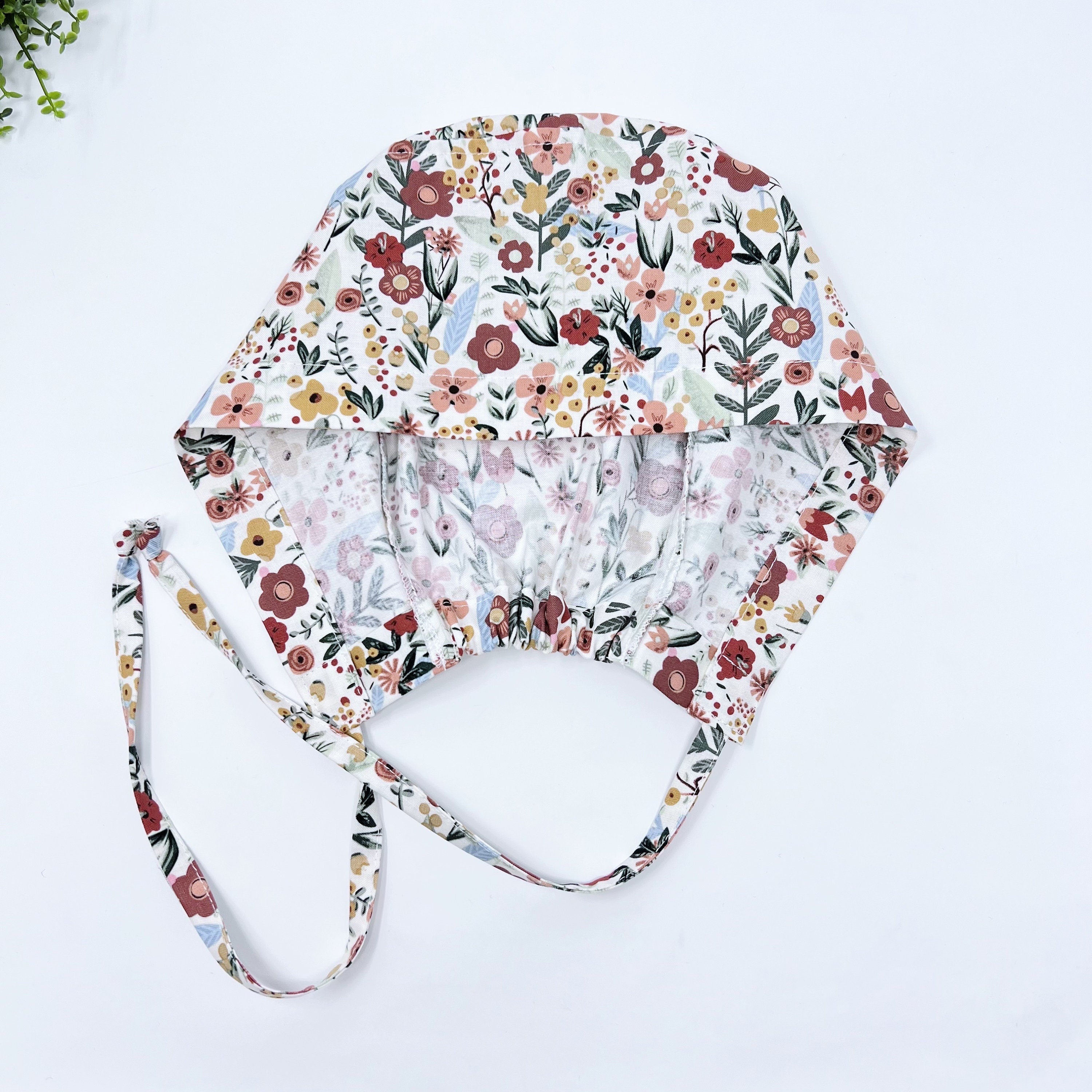 Flowers Skull tie-back style surgical scrub cap for men by Paradise Caps.