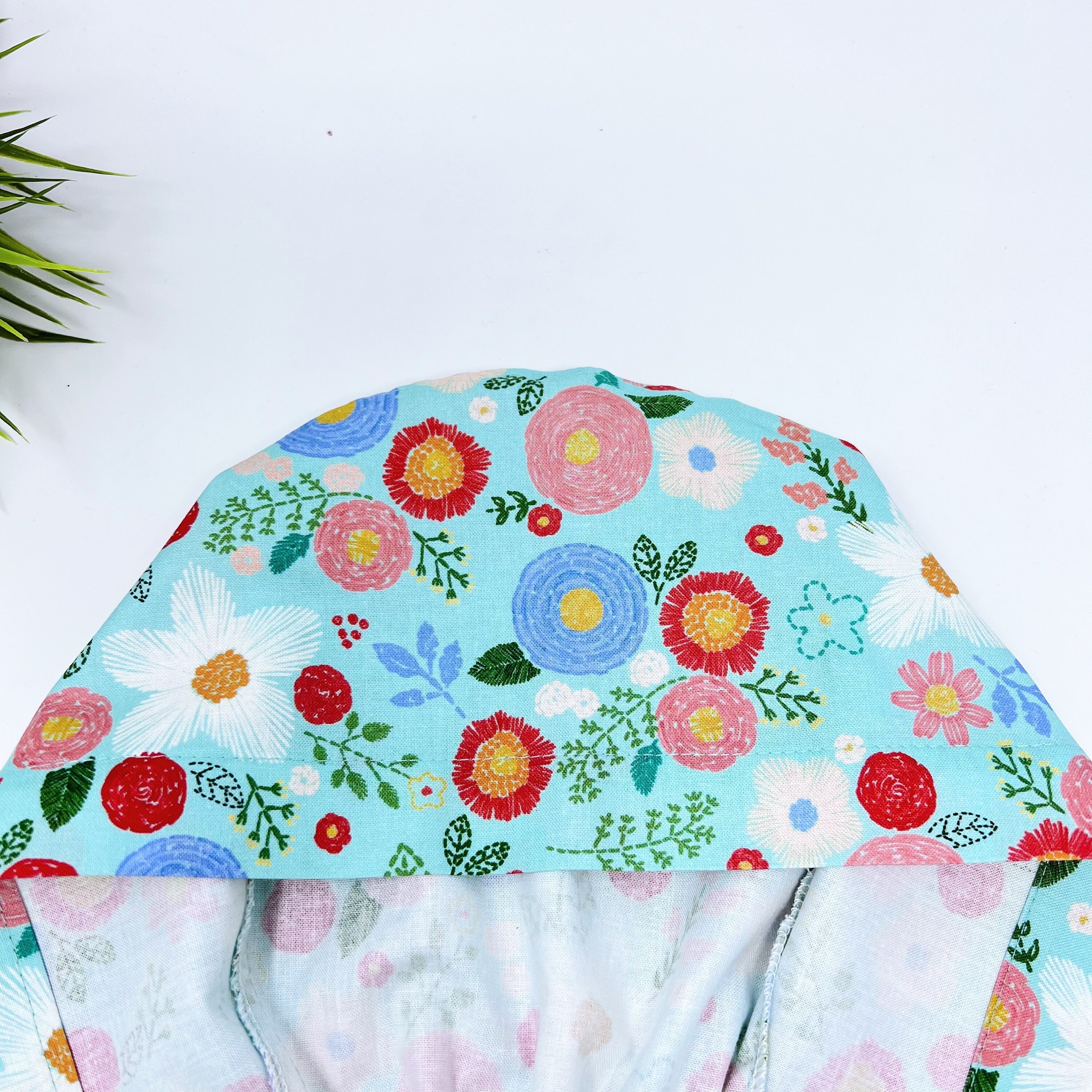 Green floral Skull tie-back style surgical scrub cap for men by Paradise Caps.