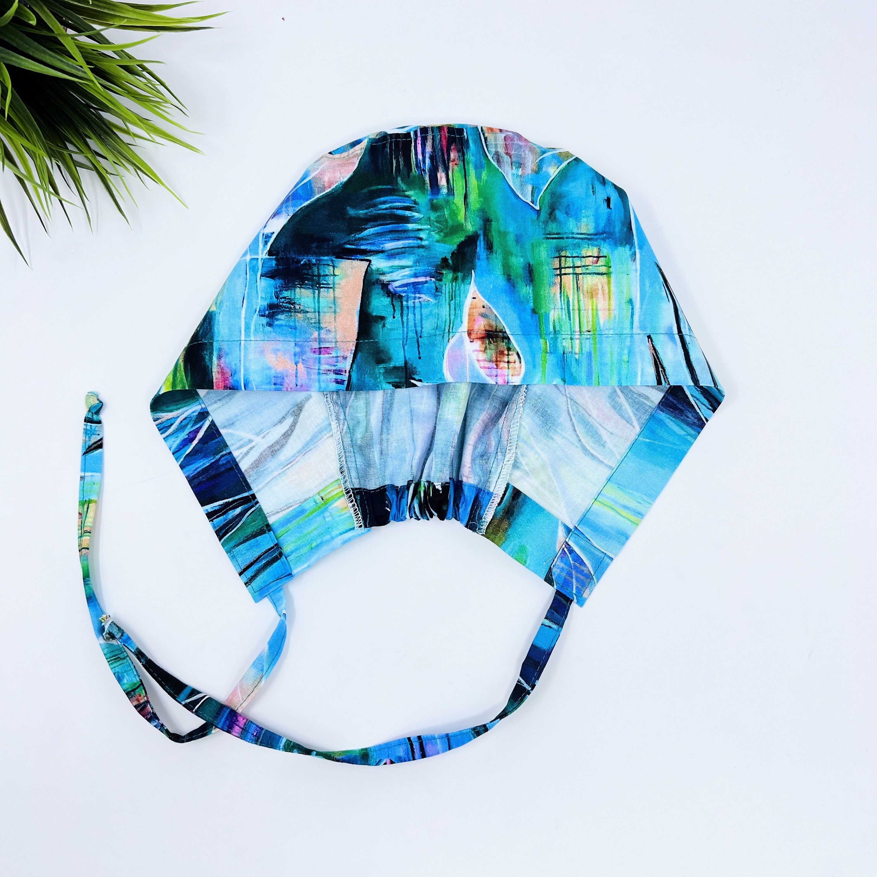 Large Floral Leaves Skull tie-back style surgical scrub cap for men by Paradise Caps.
