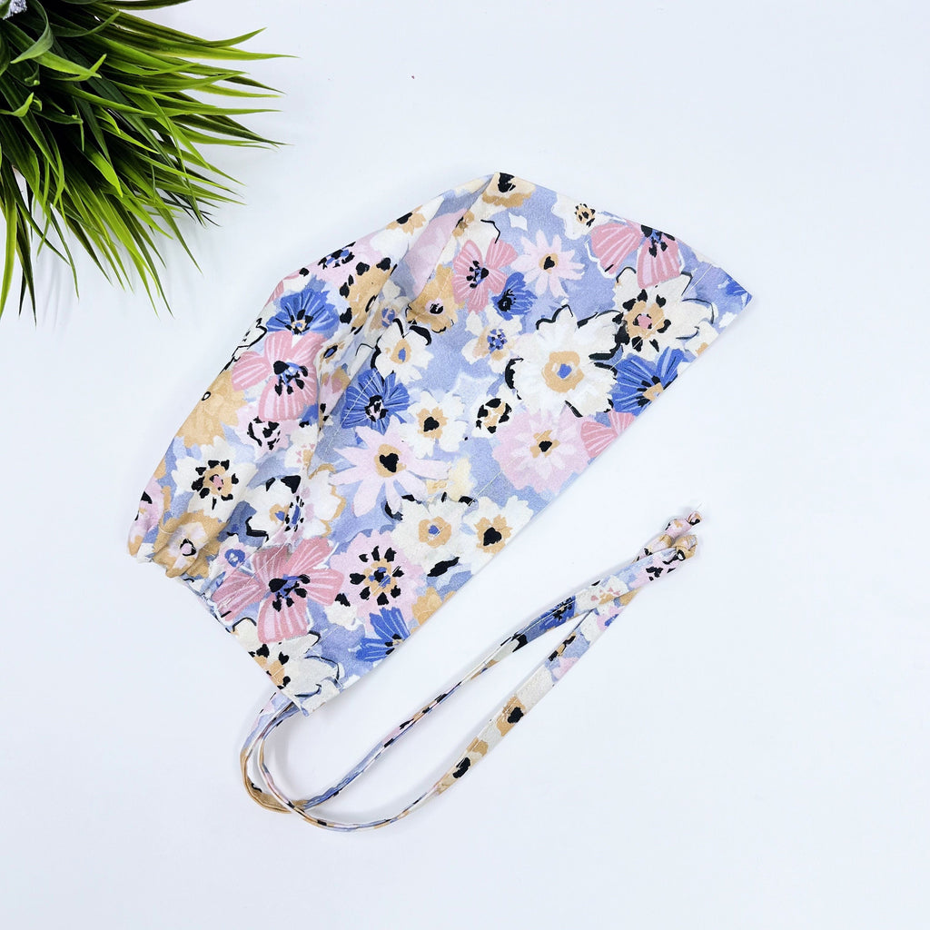 Multi Fleurs Skull tie-back style surgical scrub cap for men by Paradise Caps.